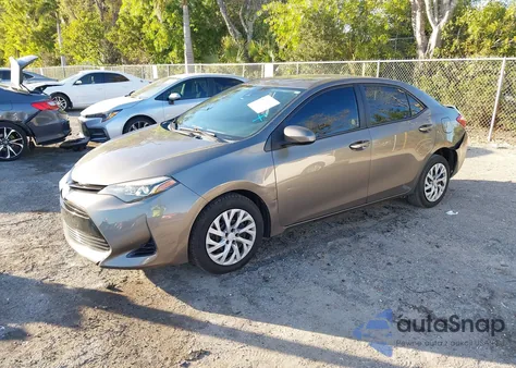 2018 Toyota Corolla Le from USA, damaged, VIN 5YFBURHE2JP799594